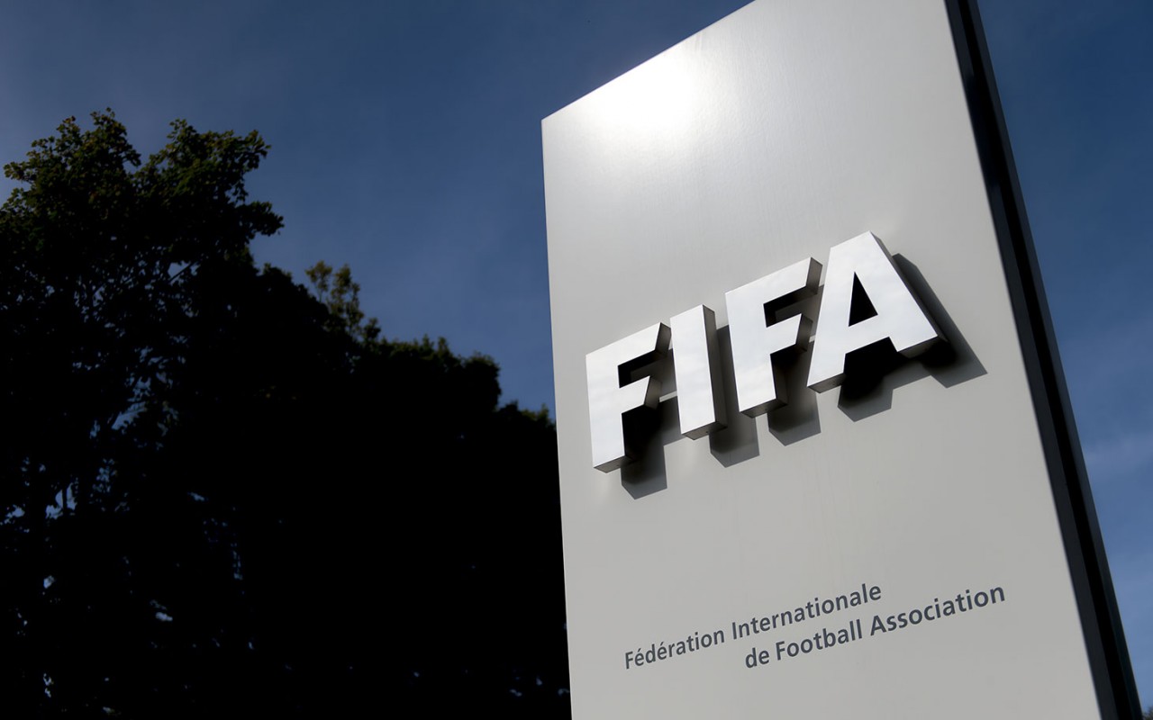 The logo of the global football's governing body FIFA is seen on October 3, 2013 at its headquarters in Zurich. FIFA kicked off a crunch meeting behind closed doors, amid claims of rights abuses by 2022 World Cup Qatar and wrangling over plans to hold the tournament in the winter. AFP PHOTO / FABRICE COFFRINI (Photo credit should read FABRICE COFFRINI/AFP/Getty Images)