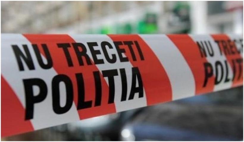 bărbat spânzurat într-o pădure