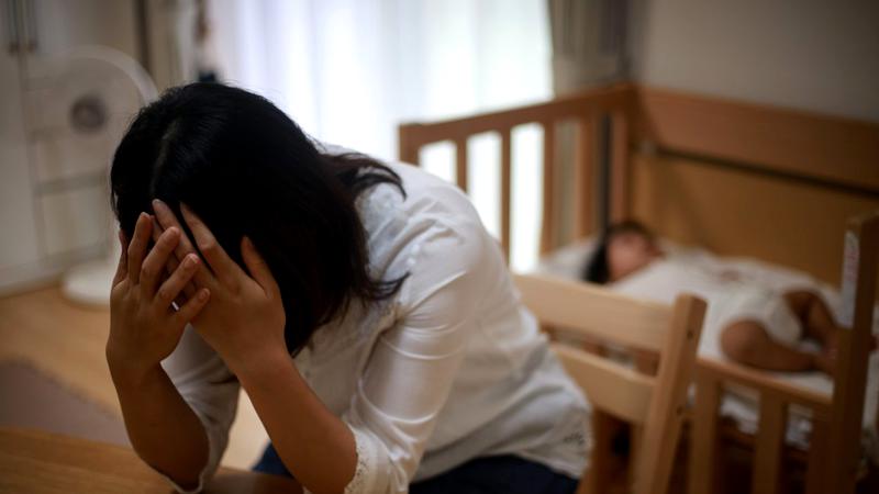 Cu bebelușul în brațe